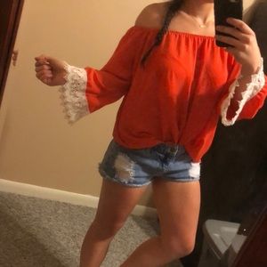 Orange of the shoulder shirt with lace detail